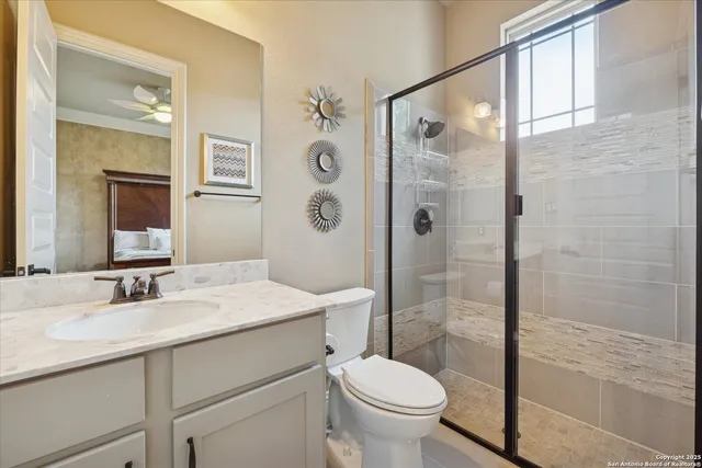 a bedroom with a bed chair and a window