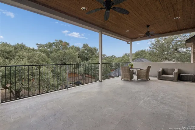 a bedroom with a bed chair and a window