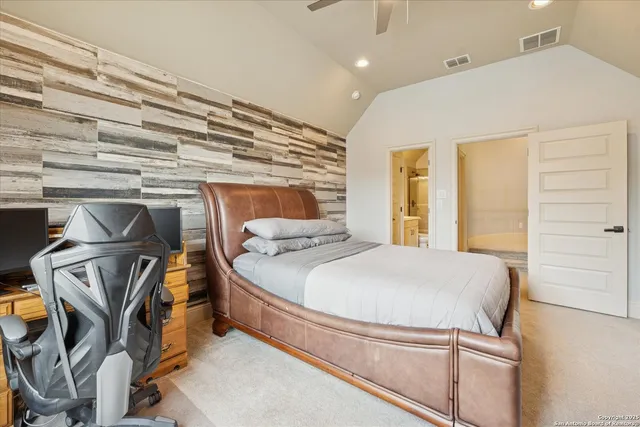 a bathroom with a sink toilet and a mirror