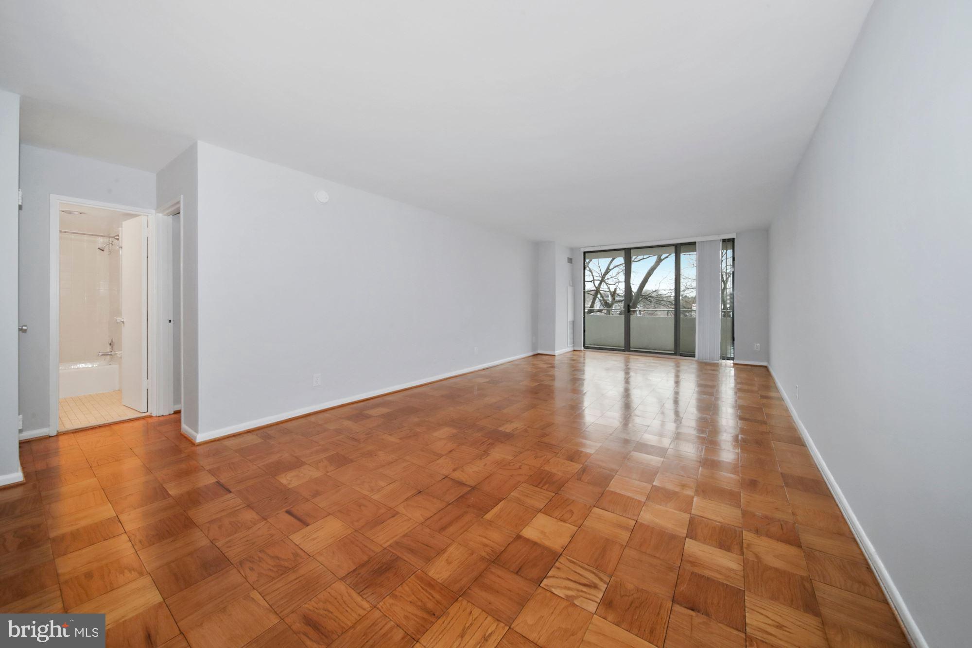 5101 River Road, Unit 609 Bethesda, MD 20816 - Photo 10 of 28 Living Room with balcony