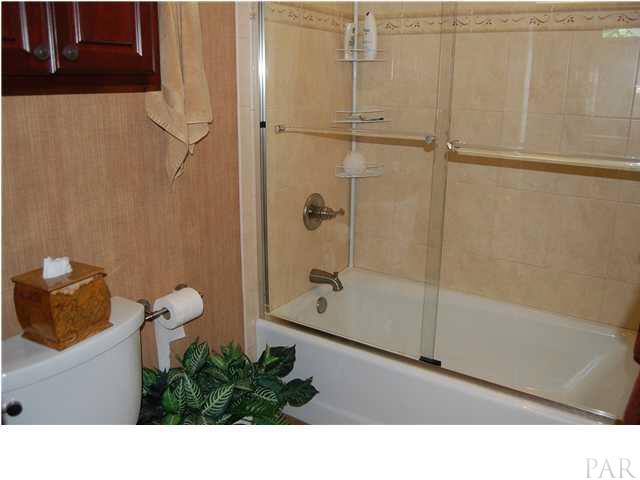 6060 Otter Point Road Pensacola, FL 32504 - Photo 16 of 23 Jack and Jill Bathroom between two guest rooms
