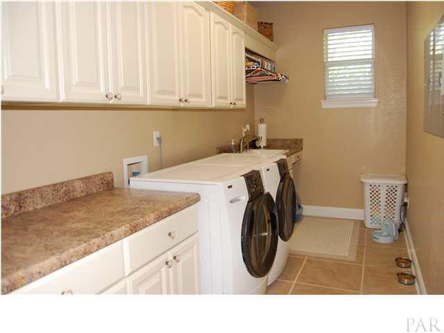 6060 Otter Point Road Pensacola, FL 32504 - Photo 19 of 23 Fourth bedroom is currently being used as a home office