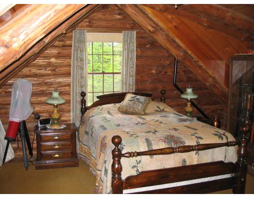 245 Chesterfield Road Westhampton, MA 01027 - Photo 9 of 14 a spacious bedroom with a bed and a window