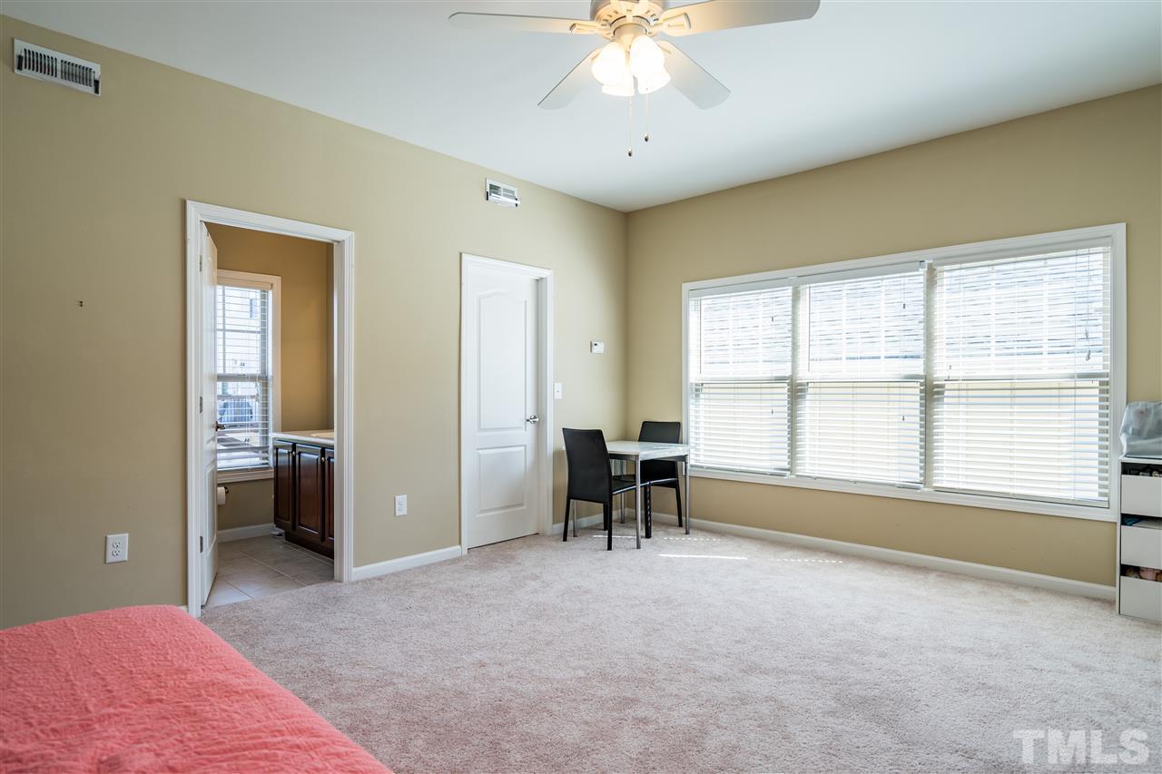 1411 Van Page Boulevard Raleigh, NC 27607 - Photo 23 of 26 a view of an empty room with a window