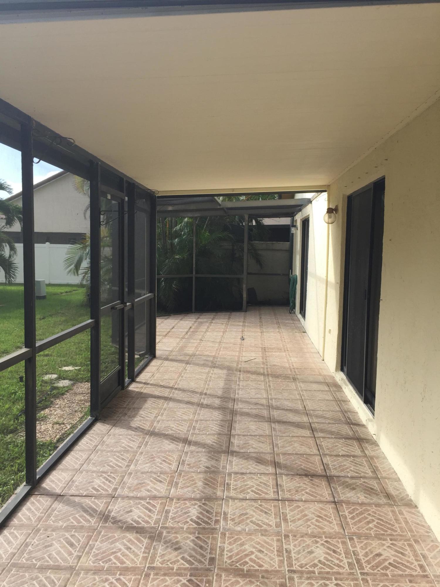 10383 Islander Drive Boca Raton, FL 33498 - Photo 8 of 10 Rear screen 2