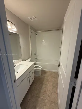 a view of a livingroom and a sink