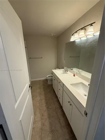 a childrens park with lots of swings and slides