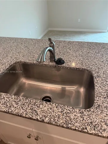 a car parked in front of a house