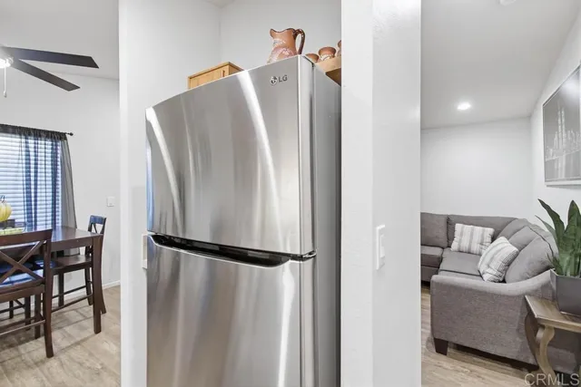 a white refrigerator freezer sitting in a kitchen