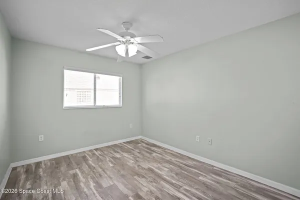 a view of a room with a fan