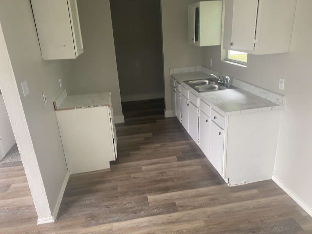 13626 Collins Street Kendleton, TX 77417 - Photo 6 of 16 a bathroom with a sink a toilet and a mirror
