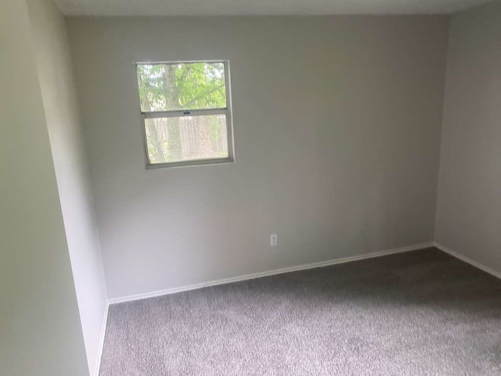 13626 Collins Street Kendleton, TX 77417 - Photo 8 of 16 an empty room with a window