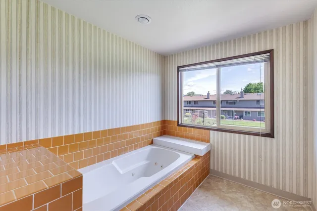 a view of a big room with air conditioner duct and materials on floor