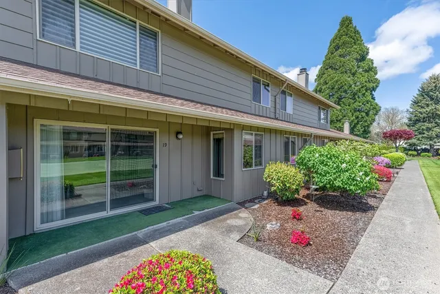 a view of a garden with a fountain