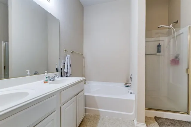 a bathroom with a sink and a bathtub