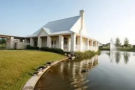 a front view of a house with lake view