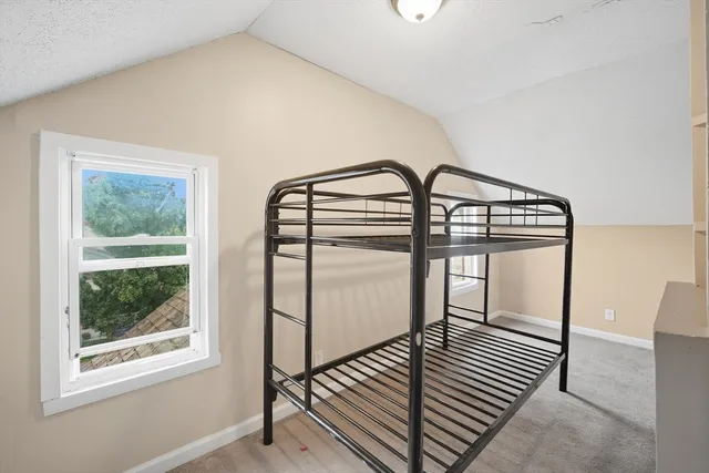 a view of staircase with large window