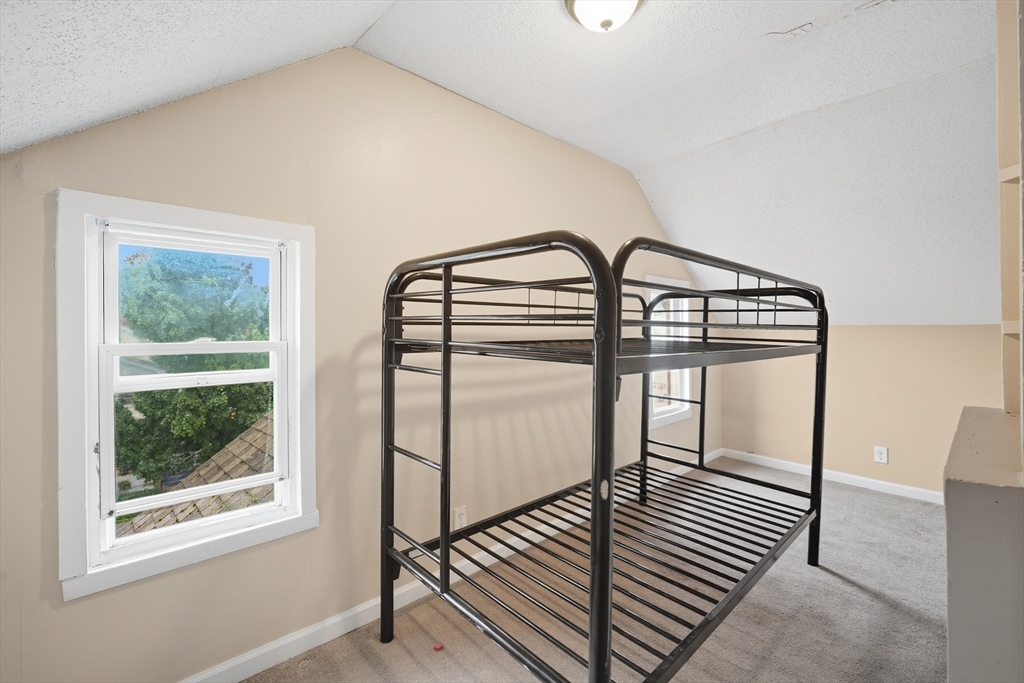 32 Santa Barbara Street, Unit 32 Springfield, MA 01104 - Photo 16 of 21 a view of staircase with large window