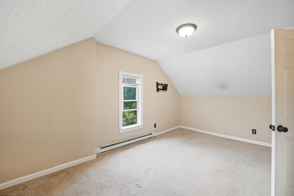 32 Santa Barbara Street, Unit 32 Springfield, MA 01104 - Photo 18 of 21 an empty room with windows