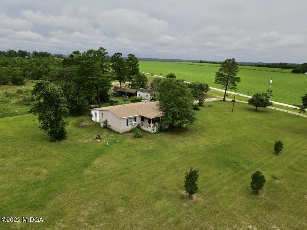 3310 Jackson Road Roberta, GA 31078 - Photo 21 of 26 a view of a garden with a bench