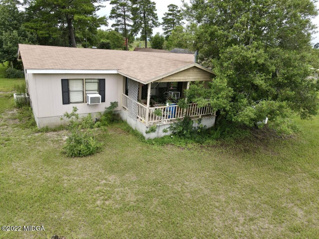 3310 Jackson Road Roberta, GA 31078 - Photo 3 of 26 an aerial view of a house with swimming pool and garden