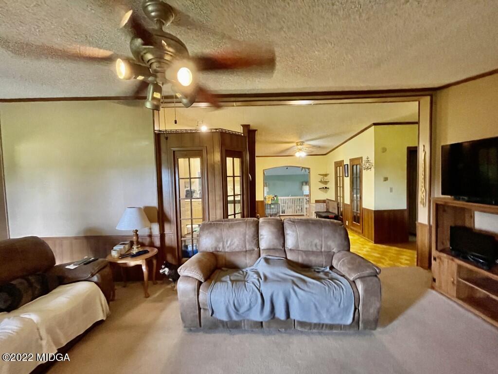 3310 Jackson Road Roberta, GA 31078 - Photo 5 of 26 a living room with furniture and a flat screen tv