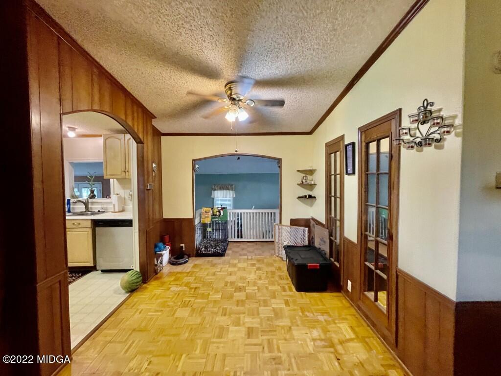 3310 Jackson Road Roberta, GA 31078 - Photo 9 of 26 a large bedroom with bed mirror and window