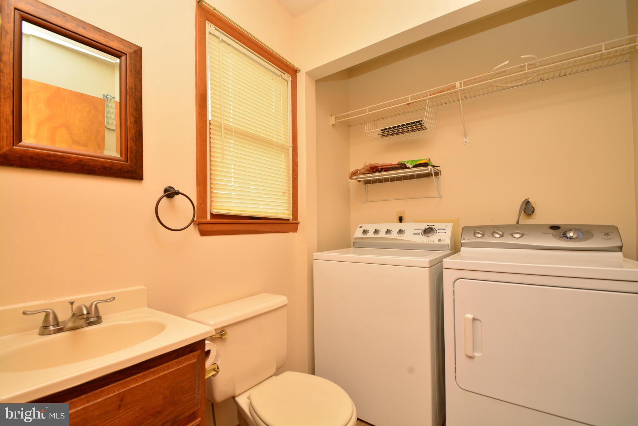 7041 Dunhill Road Baltimore, MD 21222 - Photo 12 of 30 Main Level Half Bath with Laundry