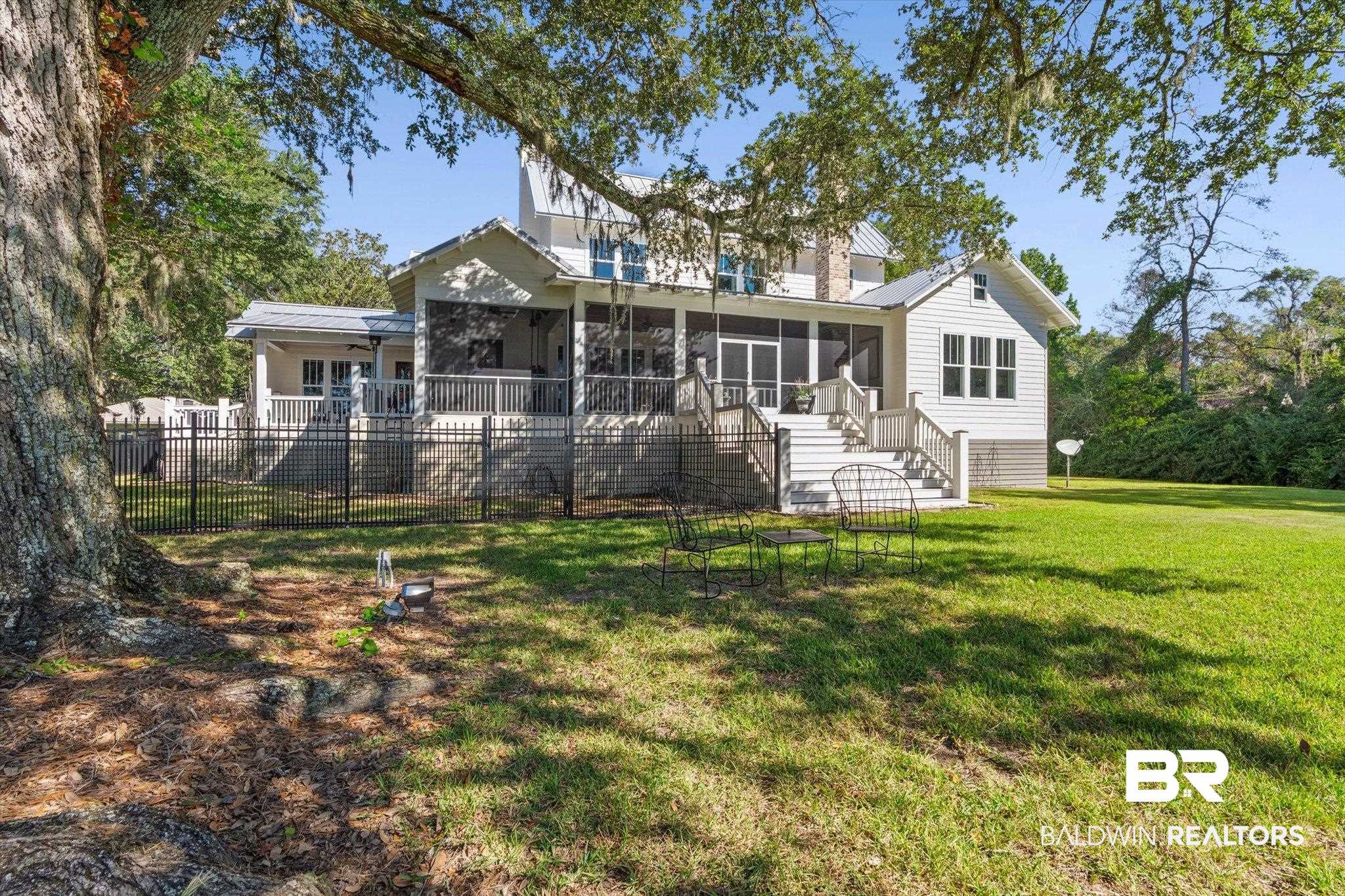 2415 Venetia Road Mobile, AL 36605 - Photo 34 of 50 Back of property featuring a sunroom and stairs
