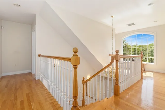 a blue bench sitting in front of a window