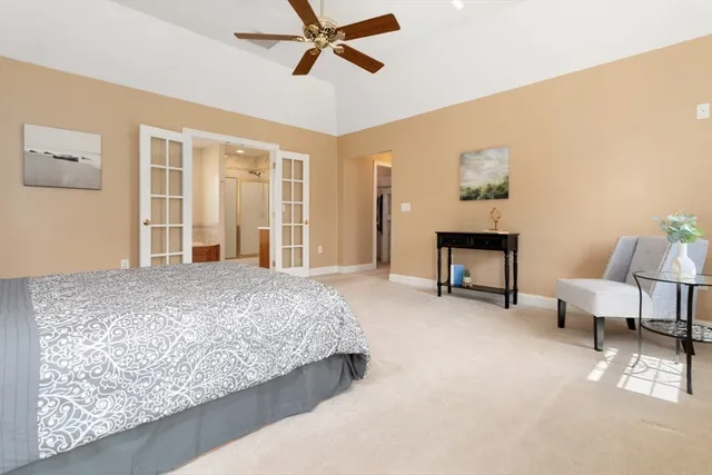 a spacious bathroom with a double vanity sink double vanity and a mirror
