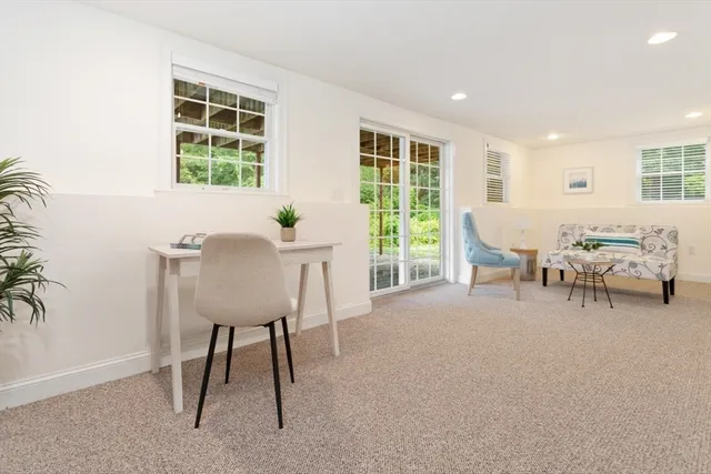 a view of a house with backyard and garden