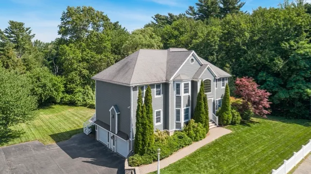 a view of a swimming pool with an outdoor space and seating area