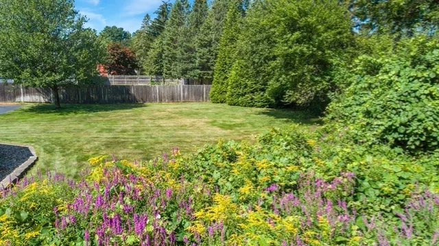 a view of balcony and deck with furniture