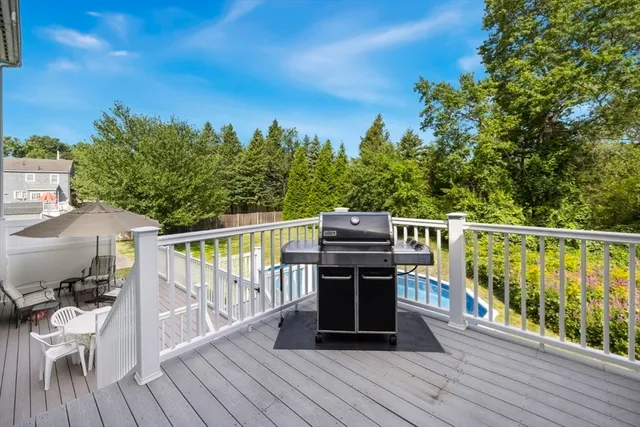 a view of a chairs and table in the balcony