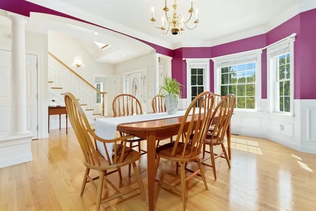 a large kitchen with stainless steel appliances granite countertop a stove and a sink