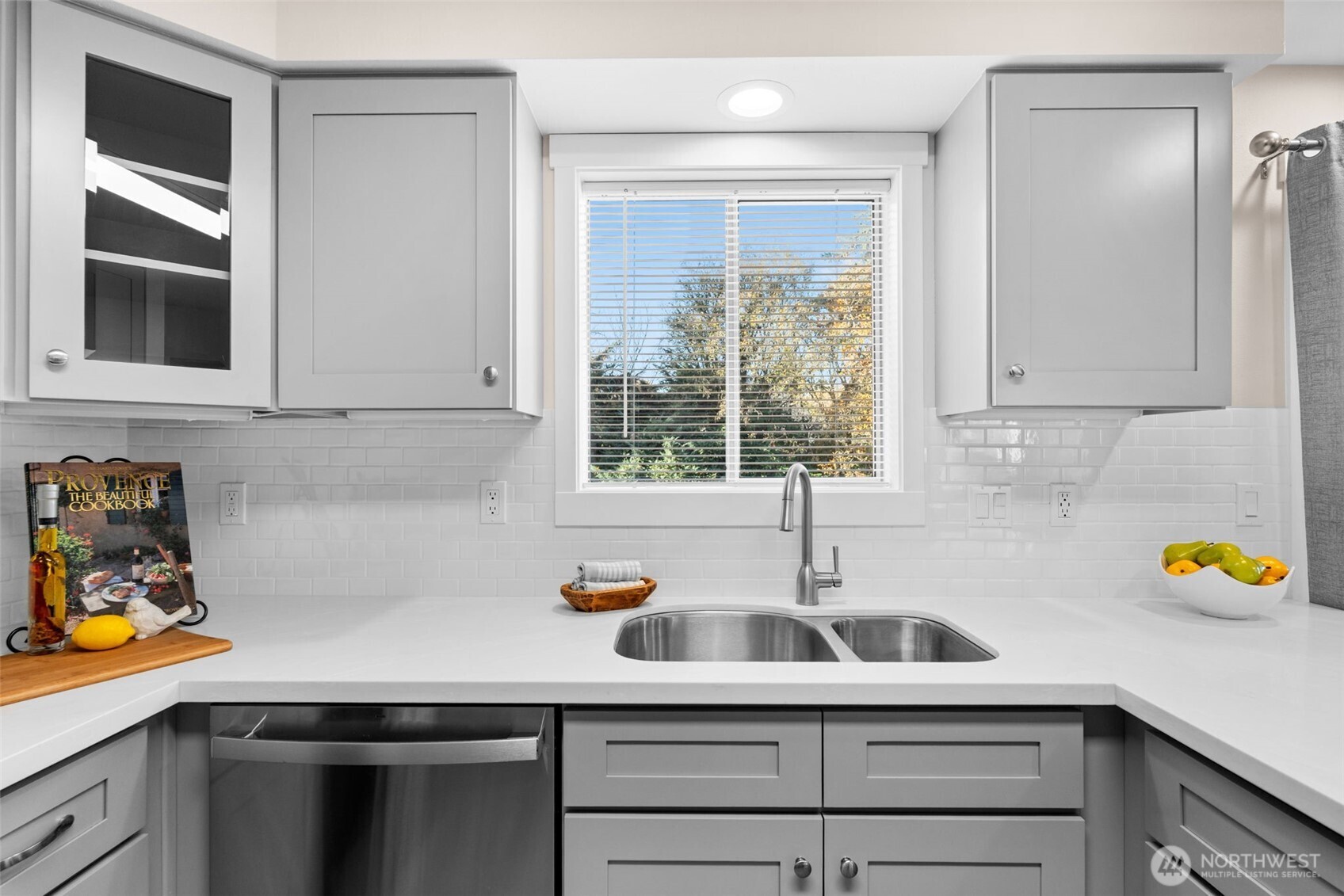 720 7th Street Southwest Puyallup, WA 98371 - Photo 13 of 40 a kitchen with a sink cabinets and window