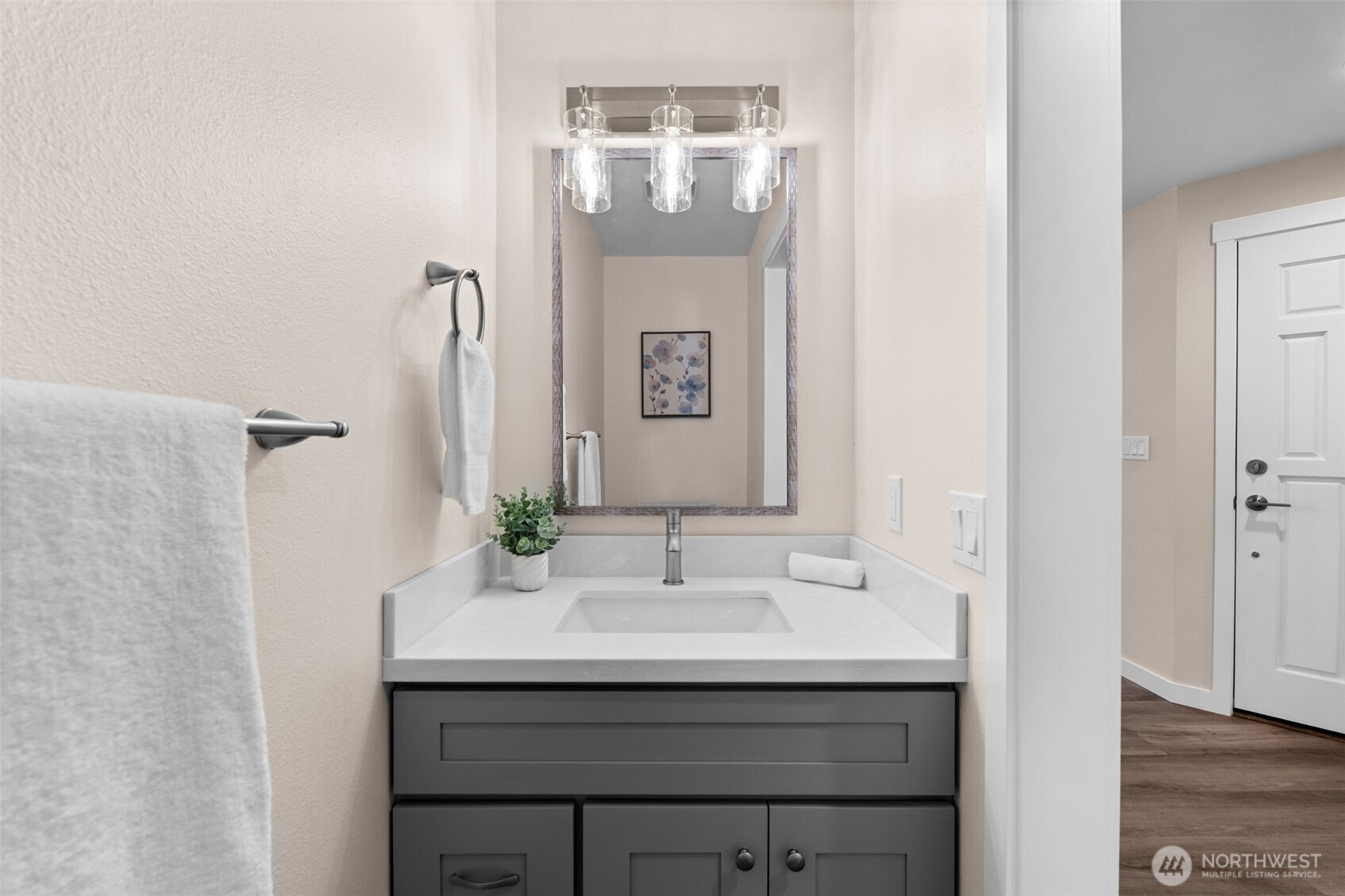 720 7th Street Southwest Puyallup, WA 98371 - Photo 15 of 40 a bathroom with a sink and a mirror