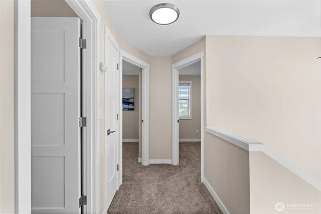 a view of a livingroom and a hallway