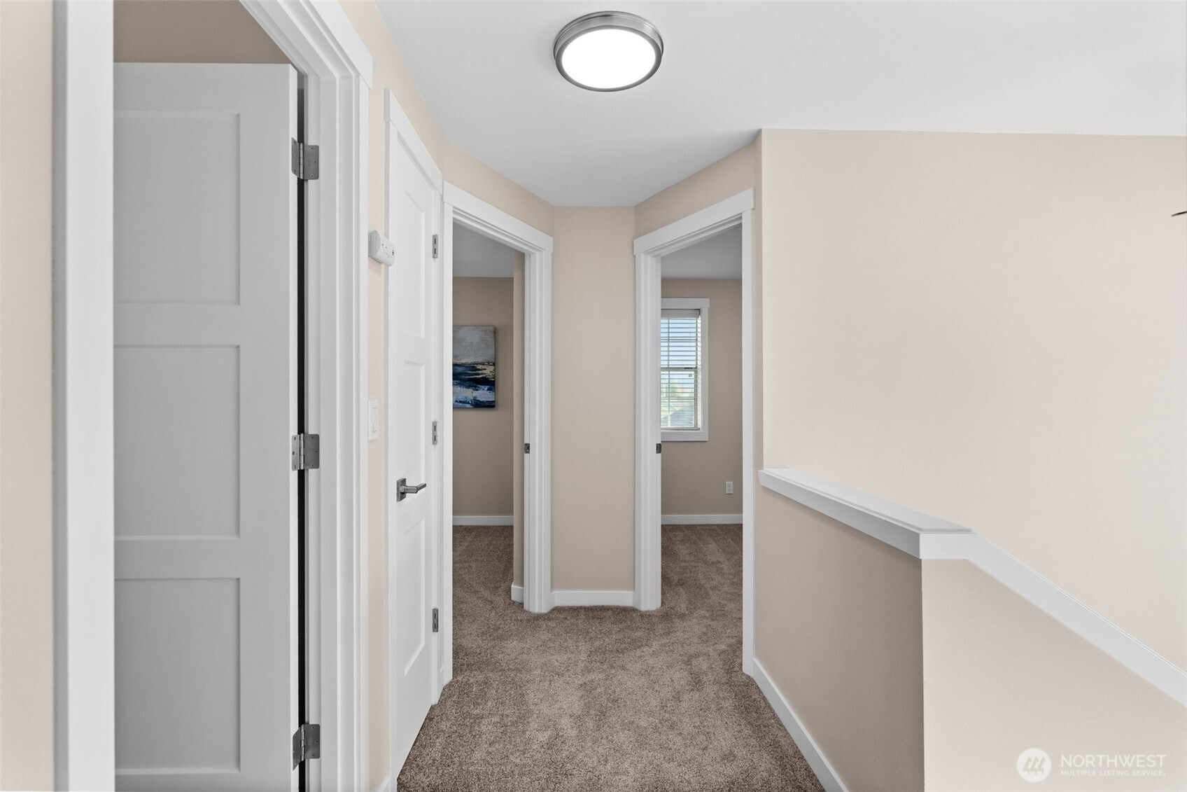 720 7th Street Southwest Puyallup, WA 98371 - Photo 16 of 40 a view of a livingroom and a hallway