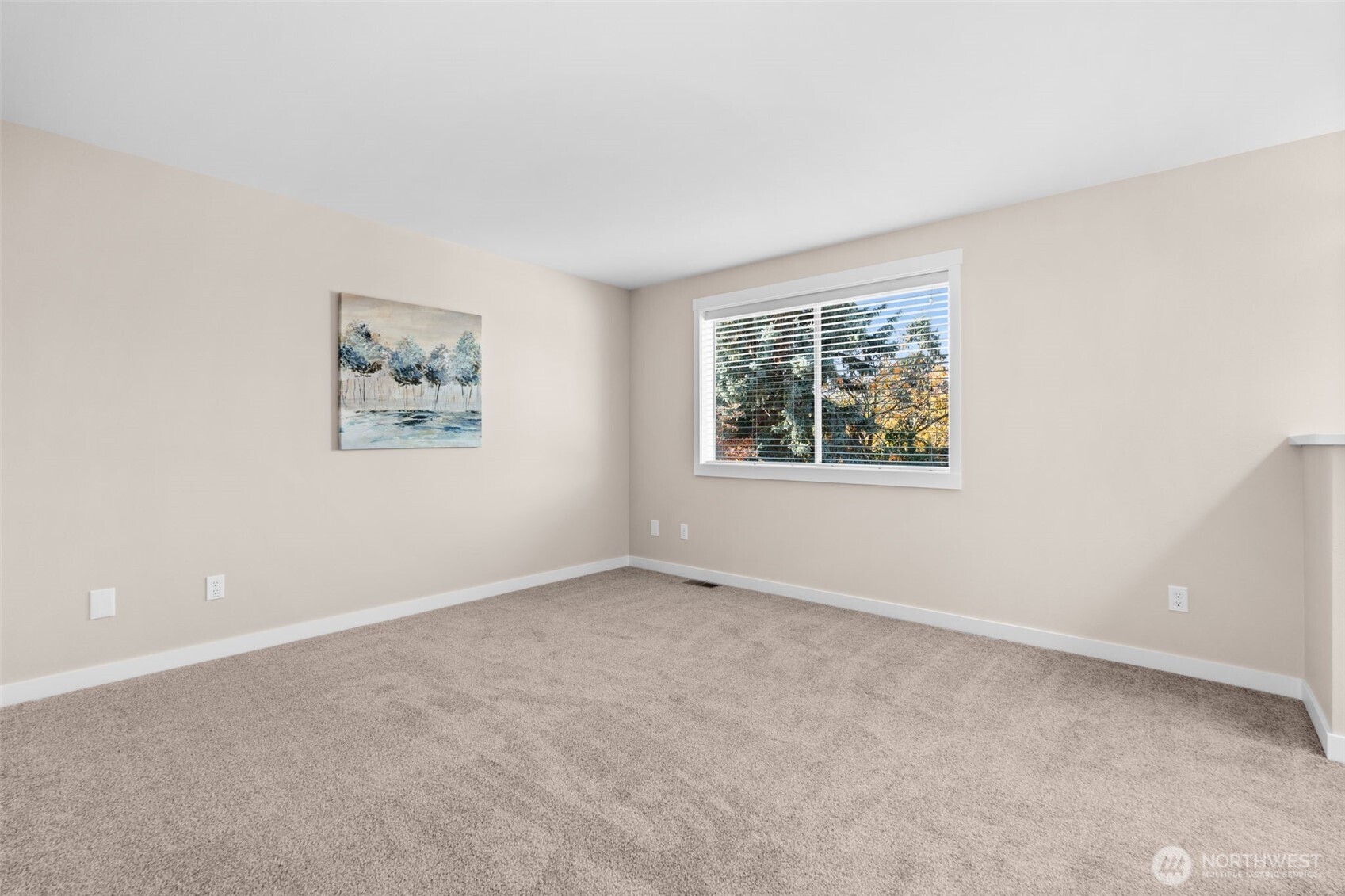 720 7th Street Southwest Puyallup, WA 98371 - Photo 17 of 40 an empty room with windows and closet