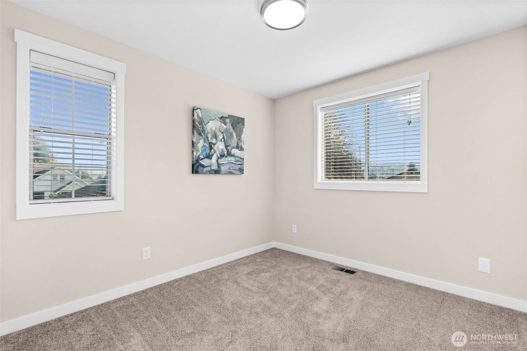 720 7th Street Southwest Puyallup, WA 98371 - Photo 25 of 40 an empty room with a window