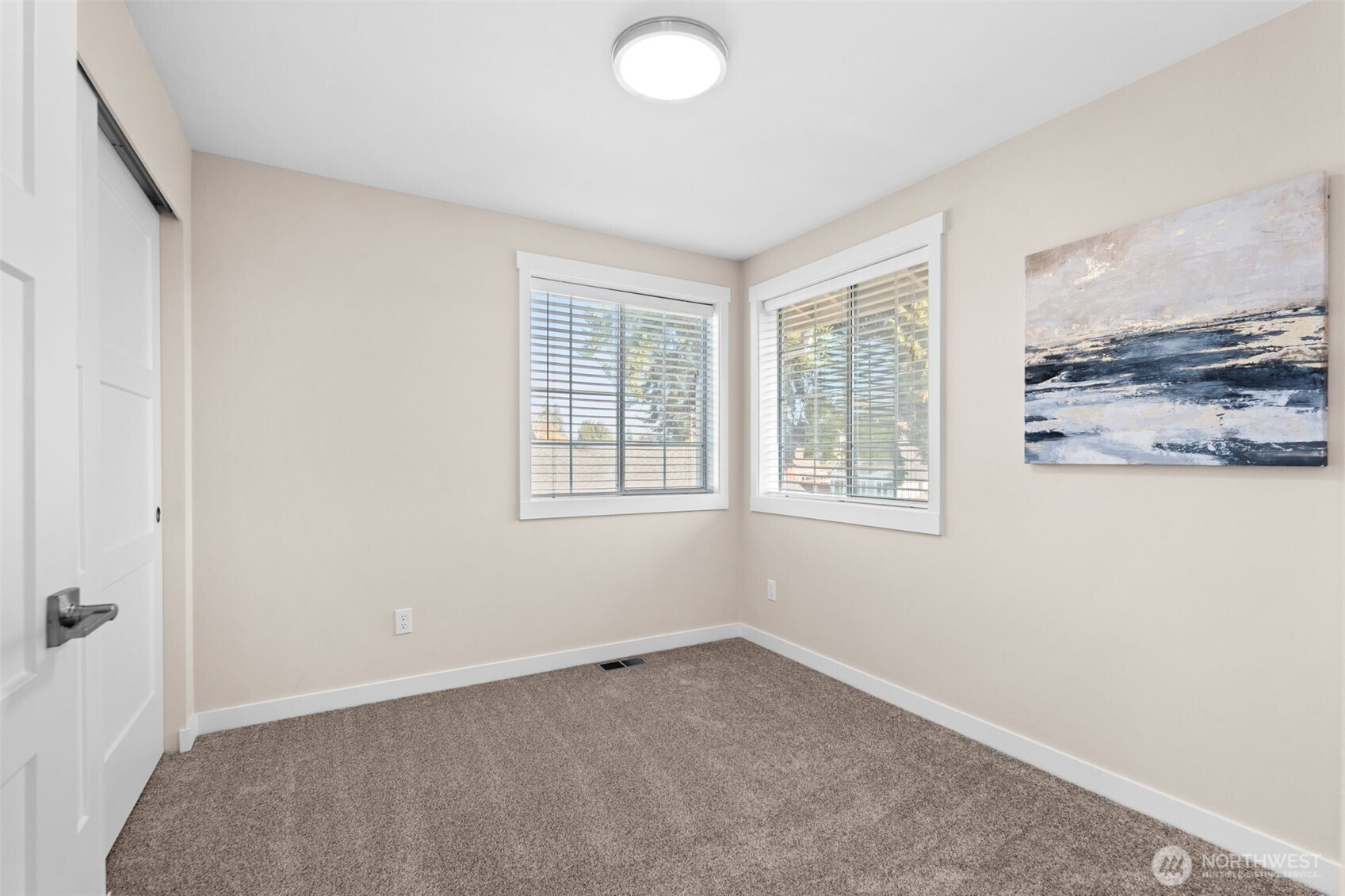720 7th Street Southwest Puyallup, WA 98371 - Photo 28 of 40 an empty room with windows