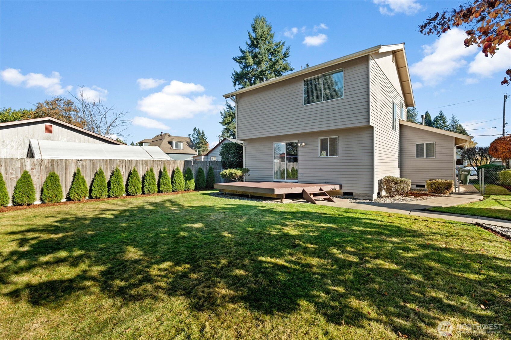 720 7th Street Southwest Puyallup, WA 98371 - Photo 34 of 40 a front view of a house with garden