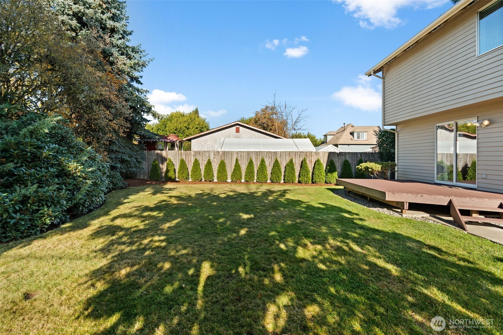 720 7th Street Southwest Puyallup, WA 98371 - Photo 35 of 40 a front view of a house with garden