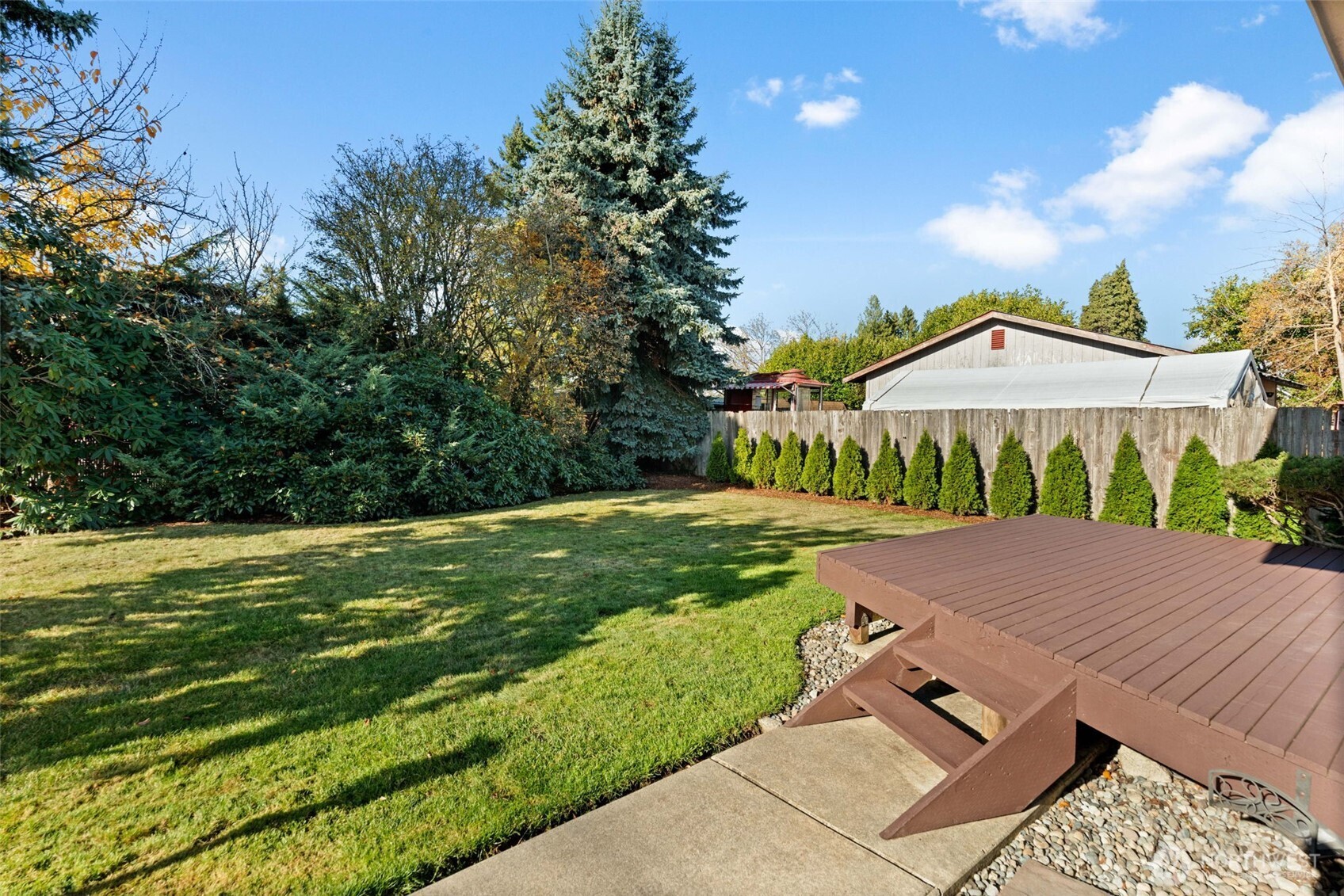 720 7th Street Southwest Puyallup, WA 98371 - Photo 36 of 40 a view of a house with a yard