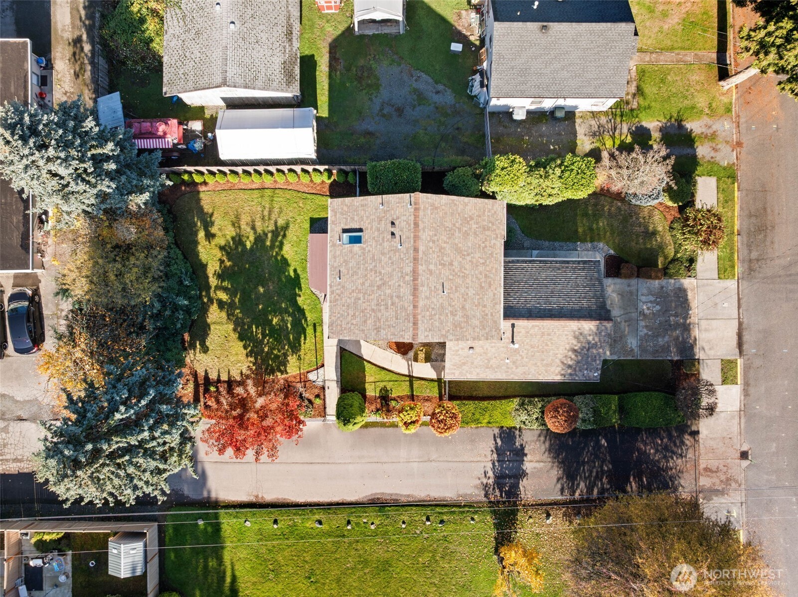 720 7th Street Southwest Puyallup, WA 98371 - Photo 38 of 40 an aerial view of residential houses with outdoor space