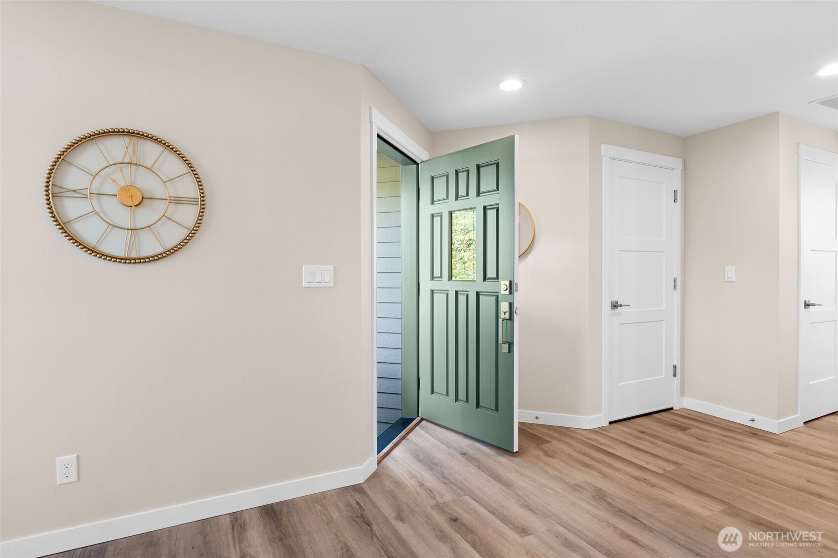 720 7th Street Southwest Puyallup, WA 98371 - Photo 4 of 40 an entryway with wooden floor