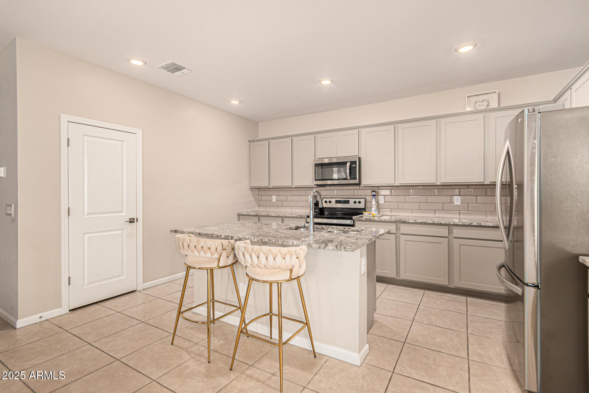 17320 West Daley Lane Surprise, AZ 85387 - Photo 15 of 46 kitchen & pantry