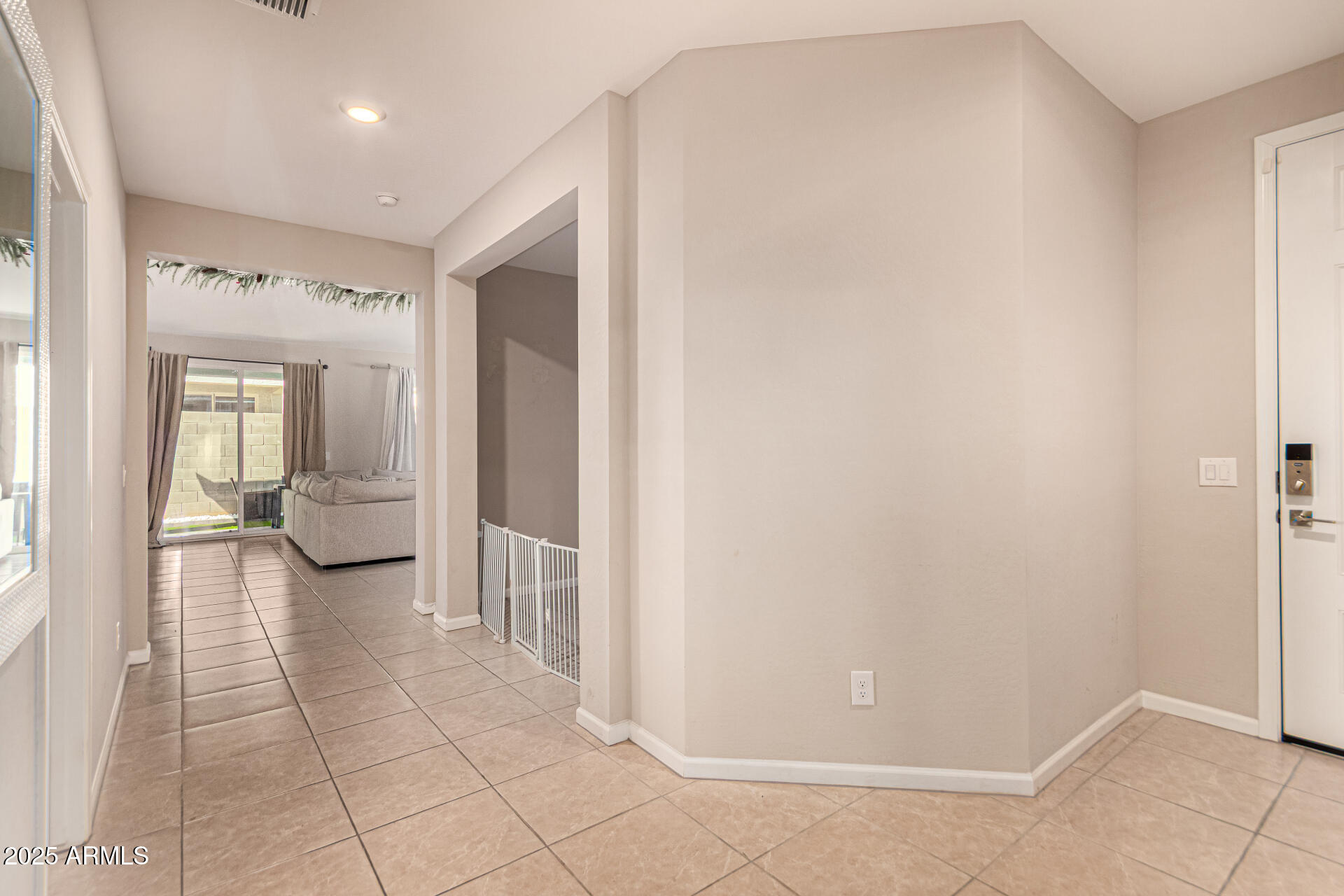 17320 West Daley Lane Surprise, AZ 85387 - Photo 27 of 46 hallway to great room